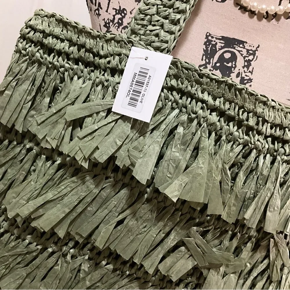 The Last Straw Fringe Straw Tote Bag. In Olive